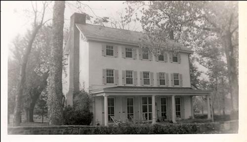 black and white photo of front of Penrose Strawbridge farm house