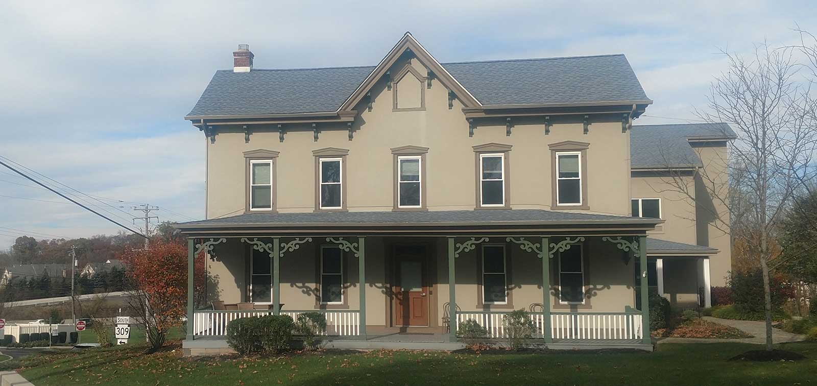 photo of south facade of addition to 1840 farmhouse
