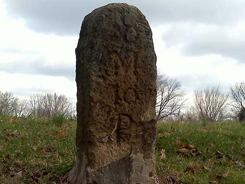 photo of stone mile marker on Governor Road saying 18 m to P (18 Miles to Philadelphia