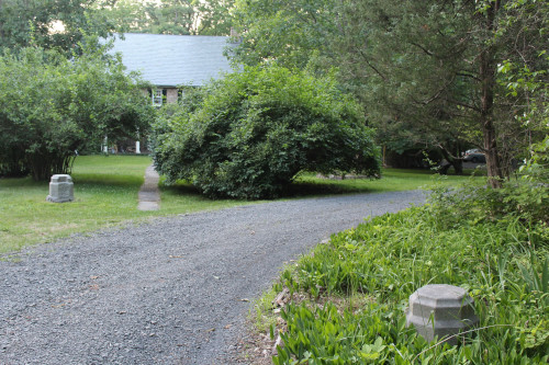 photo of driveway with stone posts