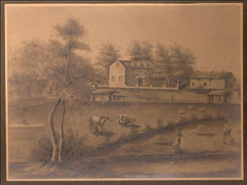 picture of Graeme Park showing Keith House in distance, several out buldings, 2 cows and 2 people working fields in foreground