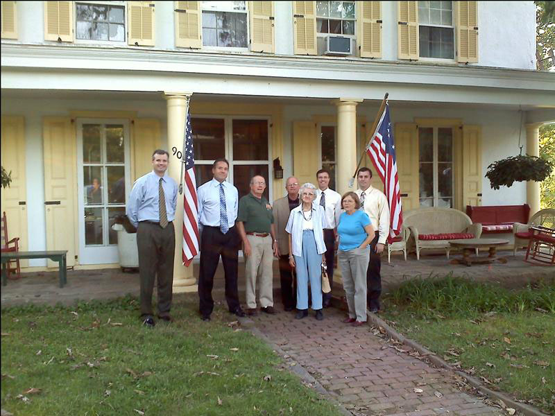photo of Horsham Township Council with Pete and Margaret Choate in the foyer of the Penrose Strawbridge House